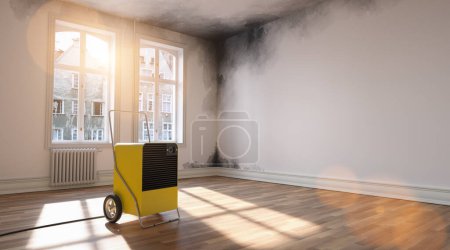 Photo for Professional dehumidifier after water damage standing in a room with Mould - Royalty Free Image