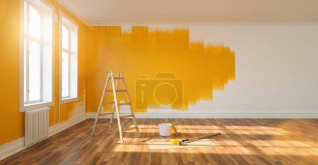 Téléchargez les photos : Peinture mur jaune dans la pièce de l'appartement après le déménagement avec échelle et seau de peinture - en image libre de droit