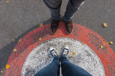 Photo for Young woman and man facing each other at the streets in a circle, personal pespective - pov - Royalty Free Image