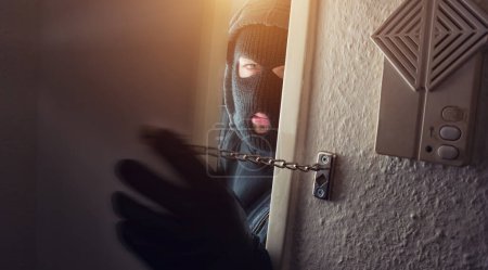 Photo for Burglar in mask at night - Royalty Free Image