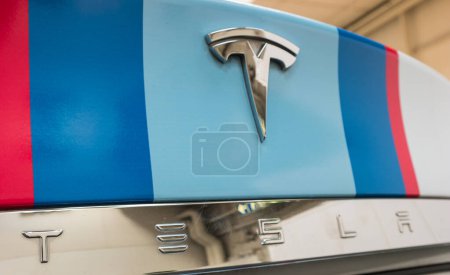 Photo for HANNOVER, GERMANY MARCH, 2017: Close-up of a Tesla Logo on a car. Tesla Motors, Inc. is an American automotive and energy storage company. - Royalty Free Image