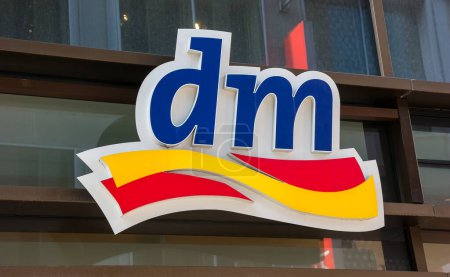 Photo for FRANKFURT, GERMANY MARCH, 2017: Dm drogeriemarkt sign. Headquartered in Karlsruhe, Dm-drogerie markt is a chain of retail drugstore chain for cosmetics, healthcare and household products and food. - Royalty Free Image
