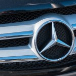AACHEN, GERMANY FEBRUARY, 2017: Mercedes Benz logo close up on a car grill. Mercedes-Benz is a German automobile manufacturer. The brand is used for luxury automobiles, buses, coaches and trucks.