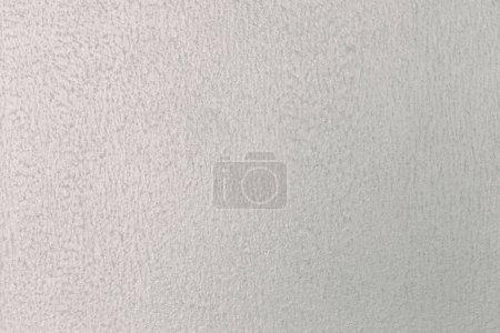 Photo for Bronze, white color with an old grunge wall concrete texture as a background. - Royalty Free Image