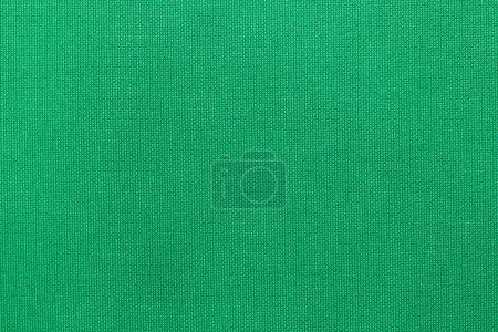 Foto de Color verde ropa deportiva tela camiseta de fútbol jersey textura y fondo textil. - Imagen libre de derechos