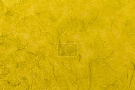 Foto de Yellow color mulberry paper texture background in close-up. - Imagen libre de derechos