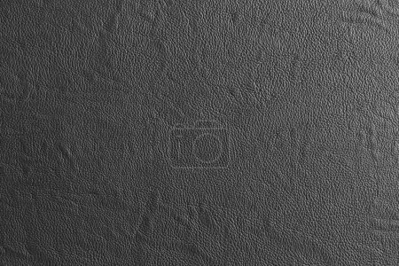 Photo for Black leather and a textured background. - Royalty Free Image