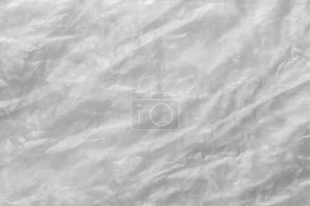 Foto de Close up of plastic foil background, Abstract background of a white color made of paper. - Imagen libre de derechos