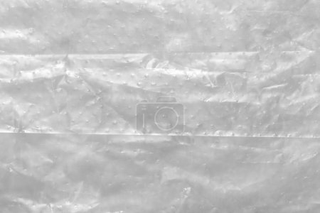 Foto de Close up of plastic foil background, Abstract background of a white color made of paper. - Imagen libre de derechos