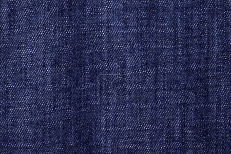 Foto de Close-up of denim jeans texture and textile background. - Imagen libre de derechos