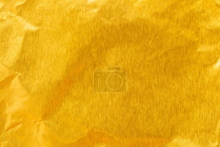 Foto de Gold paper sheet texture cardboard background. - Imagen libre de derechos
