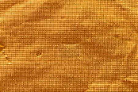 Téléchargez les photos : Gold paper sheet texture cardboard background. - en image libre de droit