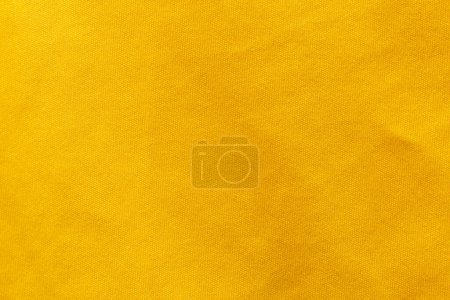 Téléchargez les photos : Tissu de couleur jaune texture polyester et fond textile. - en image libre de droit