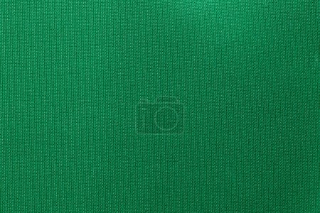 Photo for Green color sports clothing fabric football shirt jersey texture and textile background. - Royalty Free Image