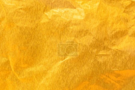 Téléchargez les photos : Gold paper sheet texture cardboard background. - en image libre de droit