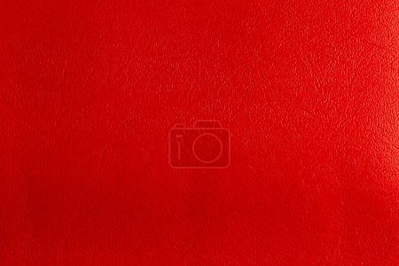 Photo for Red leather and a textured background. - Royalty Free Image