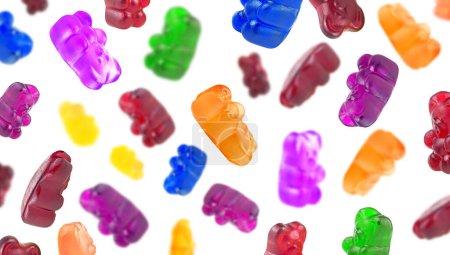Foto de Colección de deliciosos osos osos de gelatina que caen aislados sobre un fondo blanco. Dulces de jalea coloridos. - Imagen libre de derechos