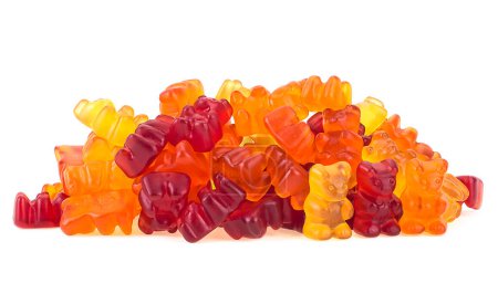 Foto de Osos de gelatina multicolores - Montón de osos de gelatina o caramelos de osos gomosos aislados sobre un fondo blanco. - Imagen libre de derechos