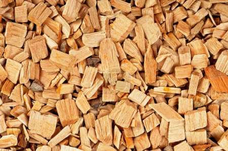 Foto de Virutas de madera como fondo, vista superior. Material natural. Chips de madera para fumar o reciclar. - Imagen libre de derechos