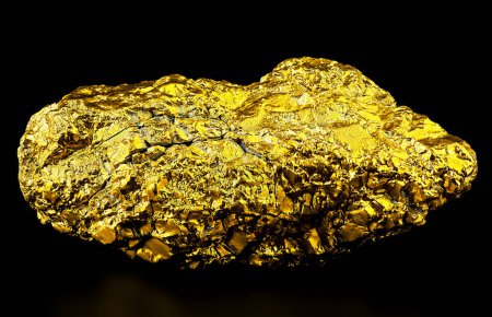 Photo for Pure gold ore on a black background. Big gold nugget. - Royalty Free Image