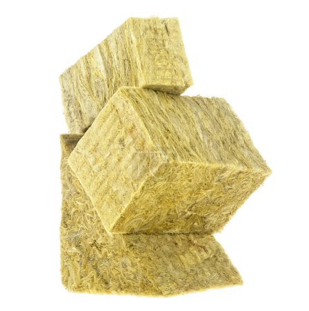 Mineral wool pieces isolated on a white background. Thermal insulation material, rock wool. Mineral fiber, mineral cotton, glass wool, MMMF, MMVF.