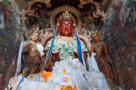 Photo for GYANTSE, TIBET - AUGUST 12, 2019:  Brightly coloured statues of Tibetan deities inside the Buddhist Kumbum chorten in Gyantse in the Pelkor Chode Monastery - Tibet Autonomous Region of Tibet - Royalty Free Image