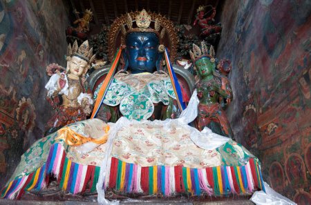 Photo for GYANTSE, TIBET - AUGUST 12, 2019:  Brightly coloured statues of Tibetan deities inside the Buddhist Kumbum chorten in Gyantse in the Pelkor Chode Monastery - Tibet Autonomous Region of Tibet - Royalty Free Image