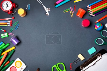 Photo for School supplies, office supplies on a black background. Flat lay style - Royalty Free Image