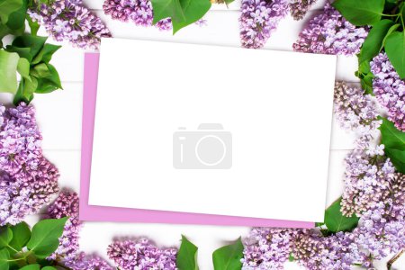 Photo for Mock up with blank letterhead and lilac frame on white wooden background. Flat lay style. Valentine's Day and Mother's Day - Royalty Free Image