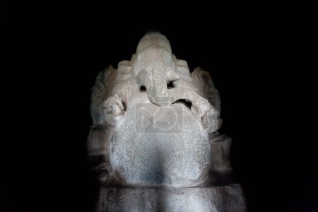 Photo for Ganesha statue carevd out of a huge boulder, Kadalekalu Ganesha tempe in Hampi, Karnataka, India, Asia - Royalty Free Image