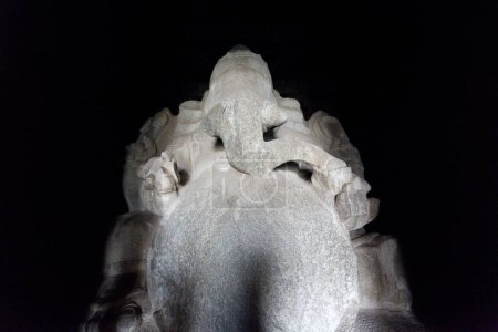 Photo for Ganesha statue carevd out of a huge boulder, Kadalekalu Ganesha tempe in Hampi, Karnataka, India, Asia - Royalty Free Image