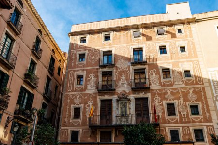Facade of an old ornate building with  frescoes at Plaza del Pi, Gothic Quarter, Barcelona, Catalonia, Spain, Europe