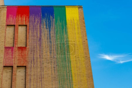Building with rainbow colors and a blue sky in Barcelona, Catalonia, Spain, Europe
