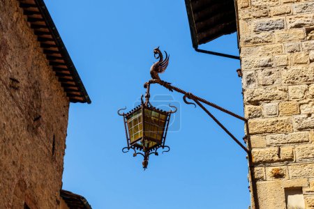 Foto de Iron dragan lantern, historic center of Volterra, Tuscany, Italy, Europe - Imagen libre de derechos