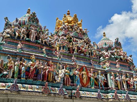 Photo for The roof of the Sri Veeramakaliamman Temple is covered with hundreds of colorful Hindu gods and goddesses. - Royalty Free Image