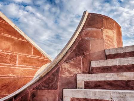 Photo for The astronomical instruments at the Jantar Mantar observatory in Jaipur. India are carved from red sandstone. - Royalty Free Image
