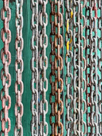 Rusty chains at an old boat yard on San Juan Island create a background image with an industrial pattern.