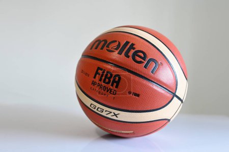 Photo for SINGAPORE - DECEMBER 16, 2022: Close up of a Molten Basketball ball on the floor. - Royalty Free Image