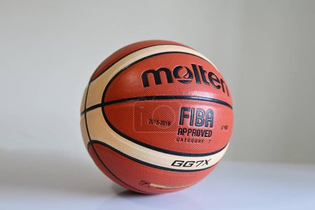 Photo for SINGAPORE - DECEMBER 16, 2022: Close up of a Molten Basketball ball on the floor. - Royalty Free Image