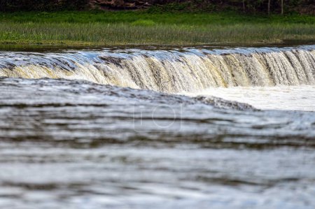 Photo for Water splashing through widest rockwaterfall in Europe - Ventas rumba. Kuldiga, Latvia - Royalty Free Image