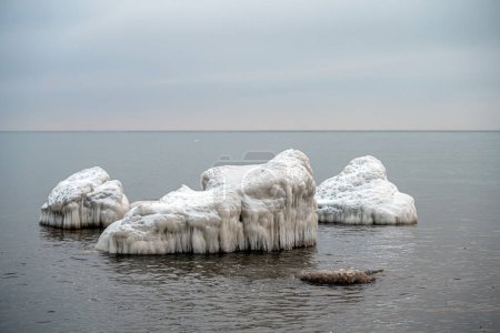 Seascape depicting landscape of Baltic sea and beach with ice and snow formations, Kaltene, Latvia