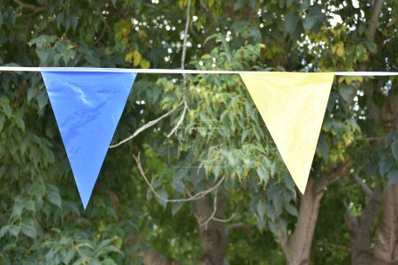 Photo for Decorative festive colorful street flags. Streamers of festive decorations - Royalty Free Image