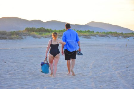Photo for Young couple in love on the beach - Royalty Free Image