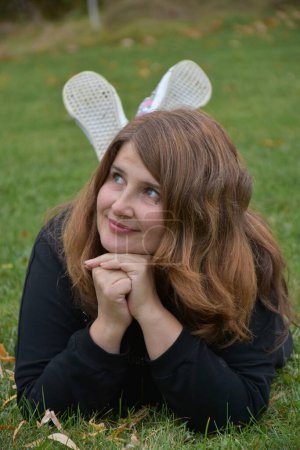 Photo for Woman in white ears of rabbit - Royalty Free Image