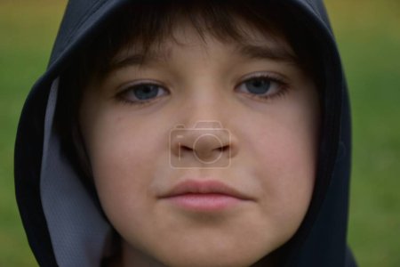 Photo for Close up of boy looking into the camera - Royalty Free Image