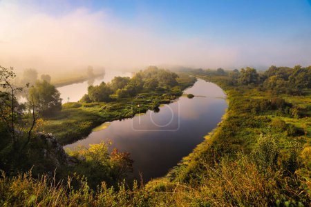 Photo for Morning fog in the river, sunrise over the river, summer landscape. - Royalty Free Image