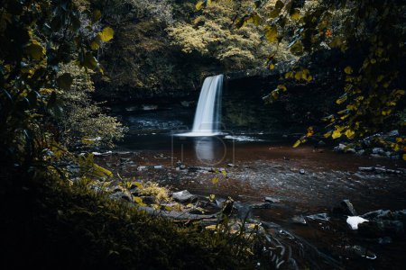 Photo for Sgwd Gwladys or Lady Falls along the Four Waterfalls walk, Waterfall Country, Brecon Beacons national park, South Wales, the United Kingdom. No people. Long exposure. - Royalty Free Image