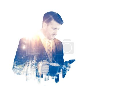 Photo for The double exposure image of the business man standing holding a mobile phone and a cup of coffee during sunrise overlay with cityscape image - Royalty Free Image