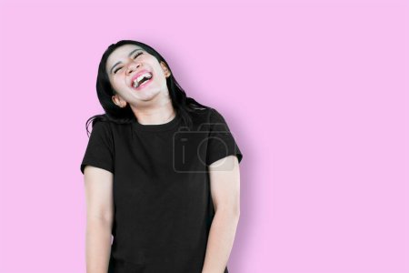 Photo for Happy Asian woman laughing isolated on white background. - Royalty Free Image