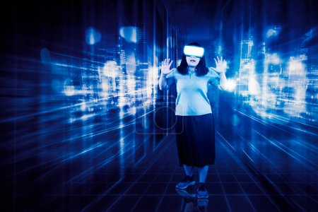 Photo for Metaverse technology concept. Woman with VR virtual reality goggles. Futuristic lifestyle. - Royalty Free Image